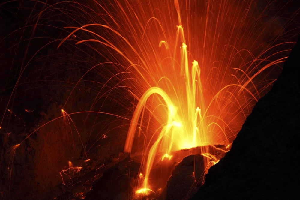 Strombolian type eruption of Batu Tara volcano Indonesia Canvas Art - Richard RoscoeStocktrek Images (18 x 12)