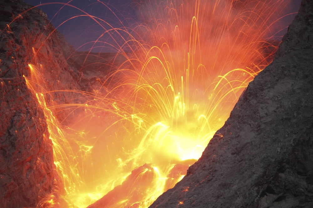 Strombolian type eruption of Batu Tara volcano Indonesia Canvas Art - Richard RoscoeStocktrek Images (35 x 23)