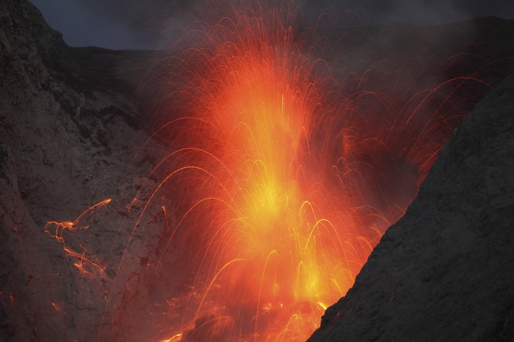 Strombolian type eruption of Batu Tara volcano Indonesia Canvas Art - Richard RoscoeStocktrek Images (35 x 23)
