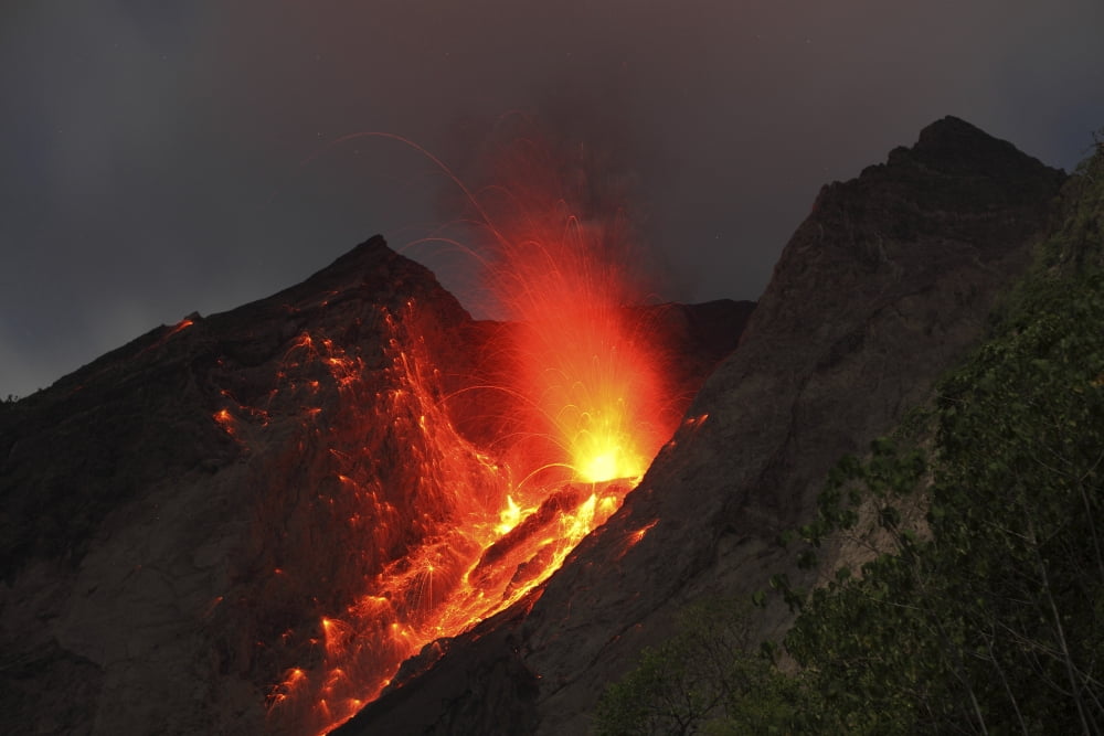 Strombolian type eruption of Batu Tara volcano Indonesia Canvas Art - Richard RoscoeStocktrek Images (35 x 23)
