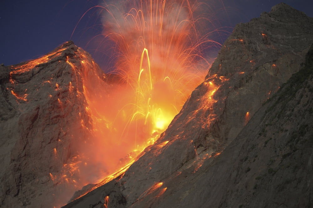 Strombolian type eruption of Batu Tara volcano Indonesia Canvas Art - Richard RoscoeStocktrek Images (35 x 23)