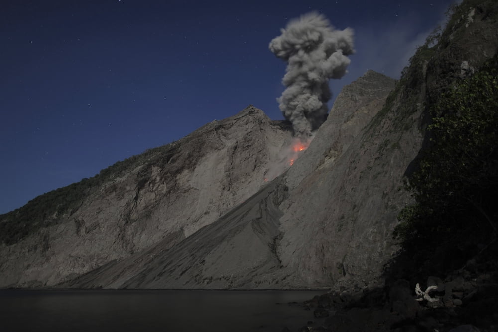 Strombolian type eruption of Batu Tara volcano Indonesia Canvas Art - Richard RoscoeStocktrek Images (35 x 23)