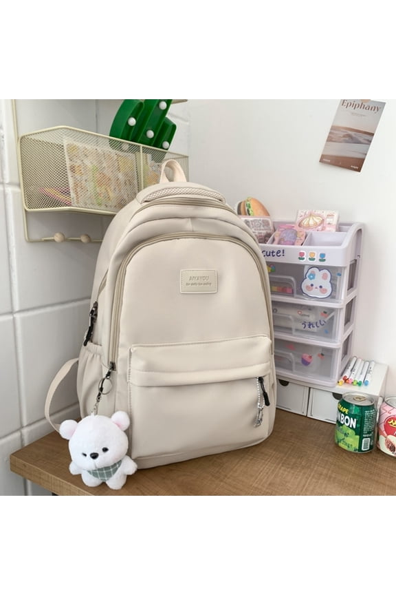 Student Japanese large-capacity backpack Teenagers simple and versatile backpack Unisex polyester material Doll decoration