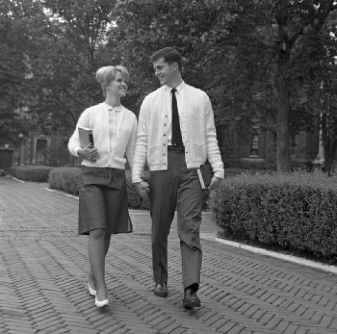 Students couple walking in park Canvas Art - (18 x 24)