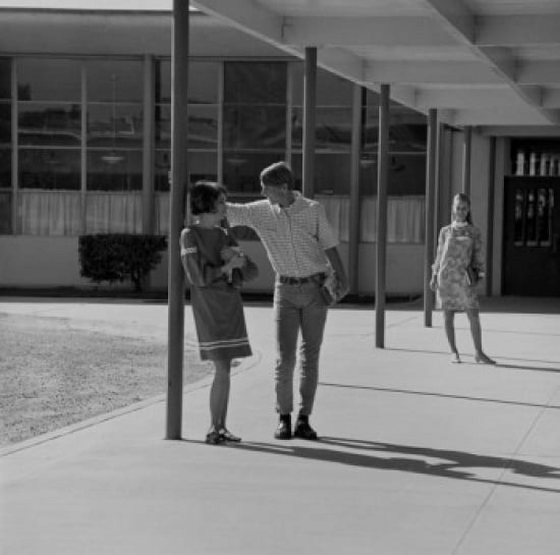 Students flirting at campus Canvas Art - (24 x 36)