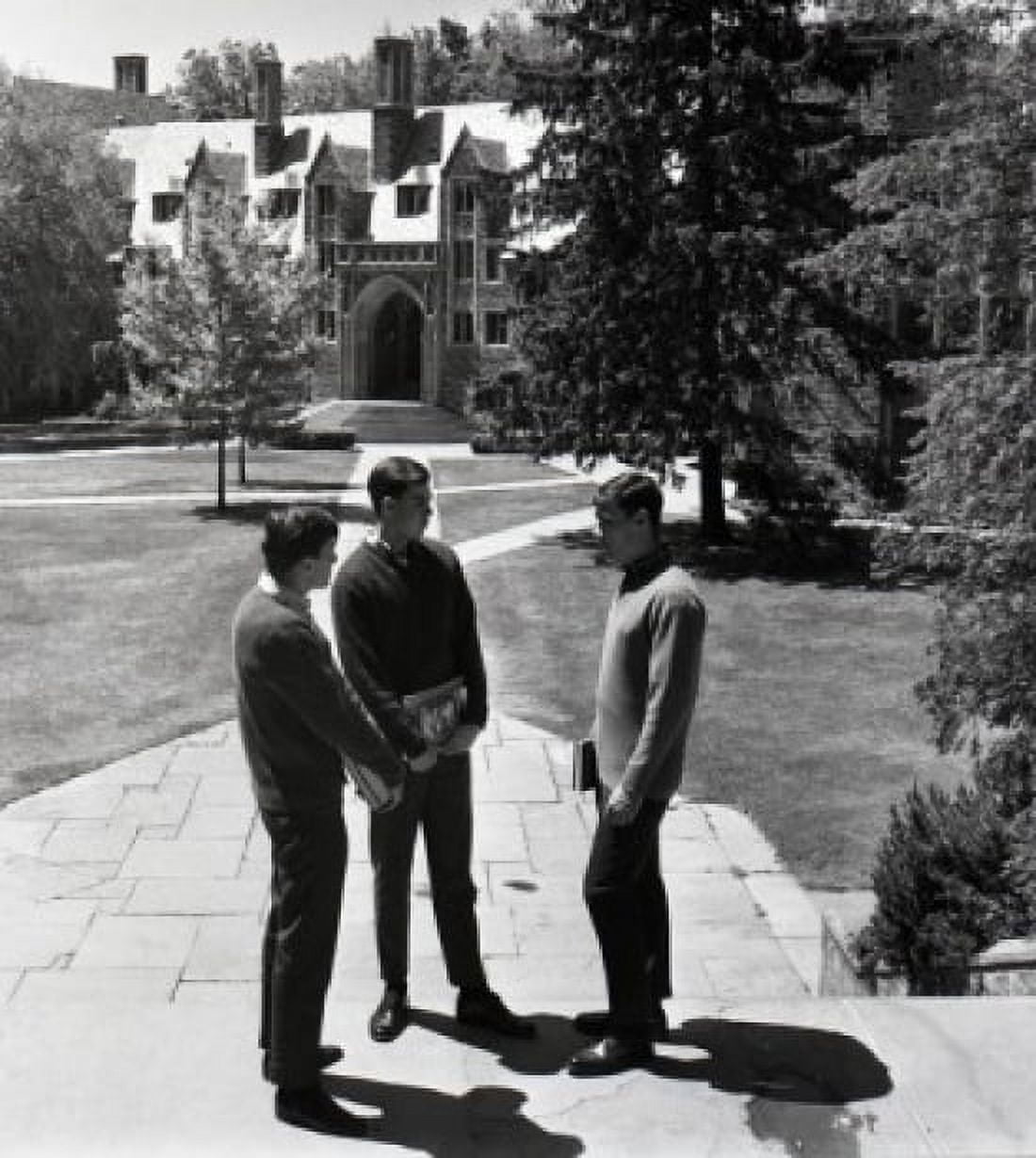 Students standing in front of college building Canvas Art - (18 x 24)