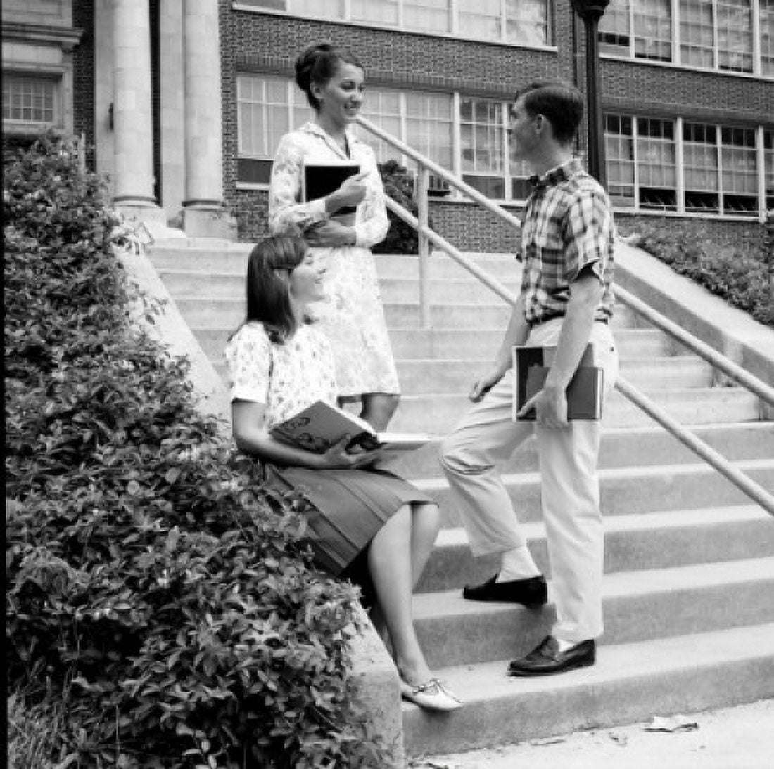 Students talking on steps outside university Canvas Art - (24 x 36)