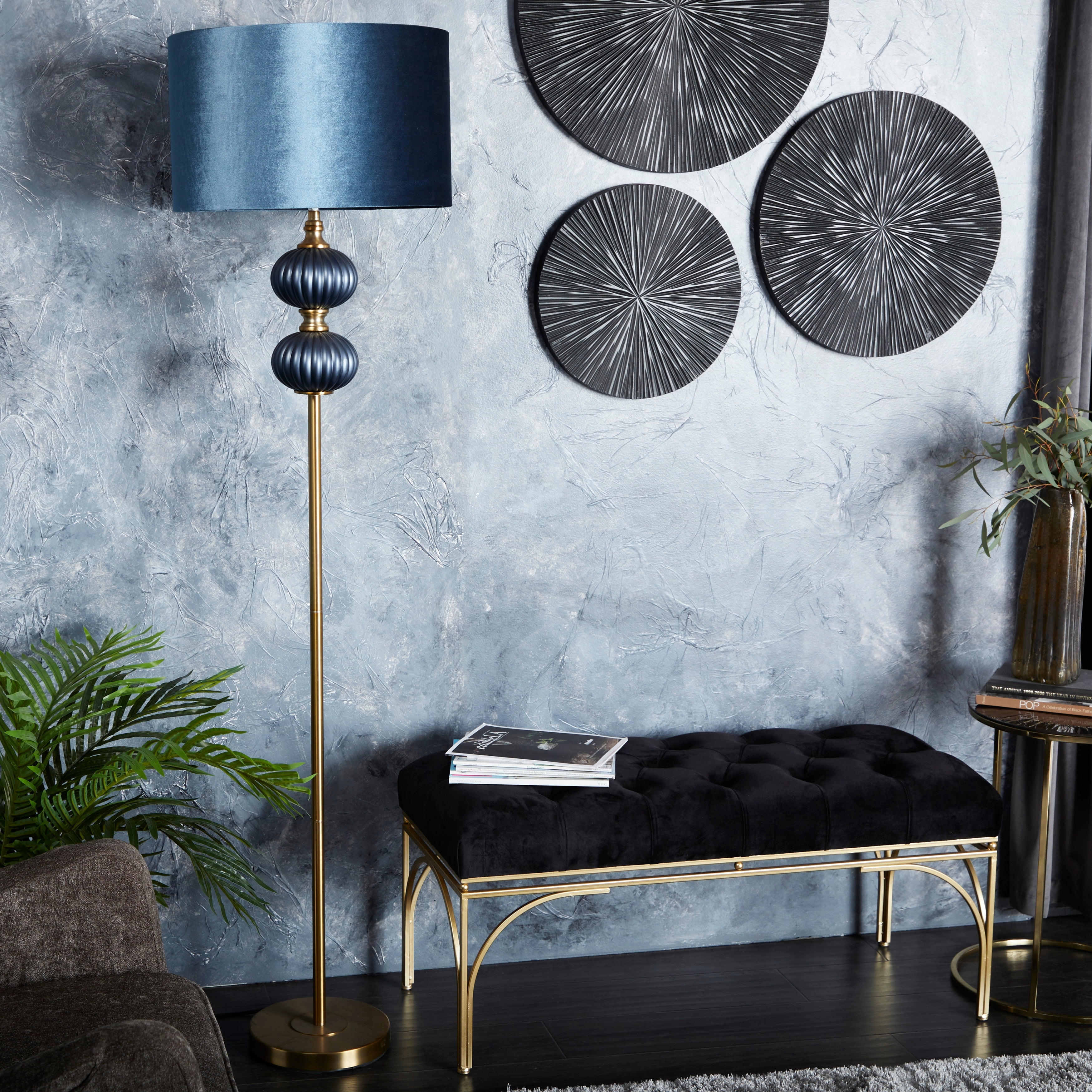 https://i5.walmartimages.com/seo/Studio-350-Blue-Fabric-Ribbed-Floor-Lamp-with-Velvet-Shade-and-Gold-Accents-18-x-18-x-69-Round_b9f33a06-b7ca-47bc-a34b-27c7fd3c3ddc.8dbbf47b3cc5ec1e8753bf117da9f64b.jpeg