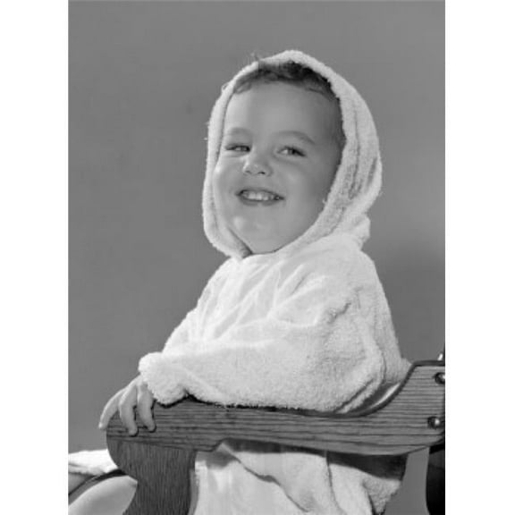 Studio Portrait of Baby Boy Sitting in Chair Poster Print - 18 x 24 in.