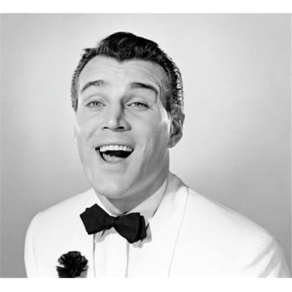 Studio Portrait of Man Wearing Bow Tie Poster Print - 18 x 24 in.
