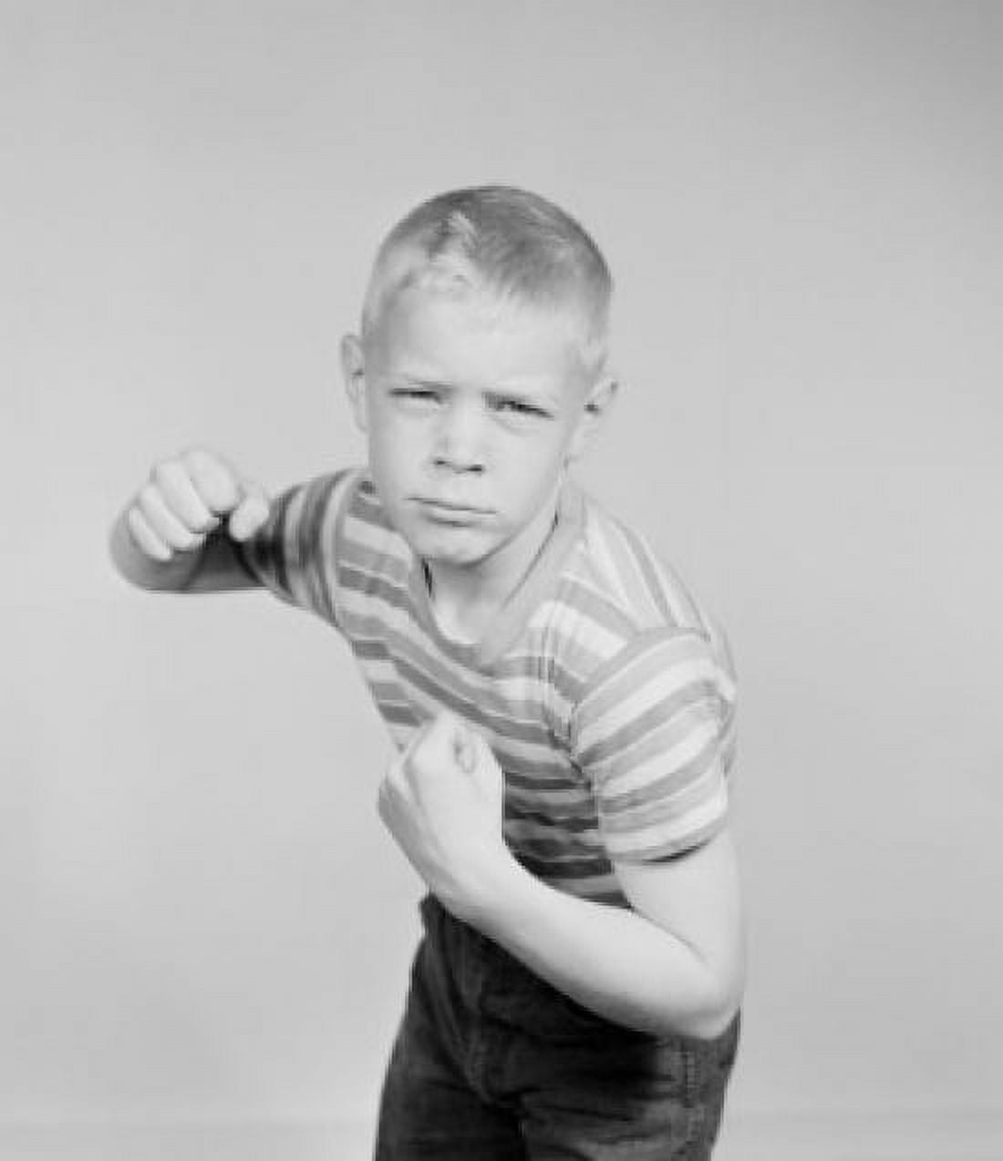 Studio portrait of boy clenching fists Canvas Art - (24 x 36)