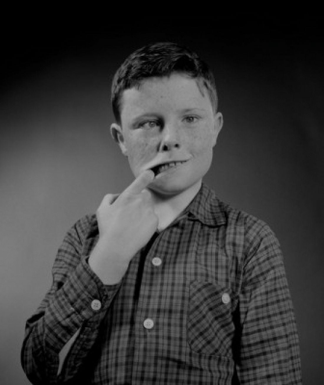 Studio portrait of boy making face Canvas Art - (18 x 24)