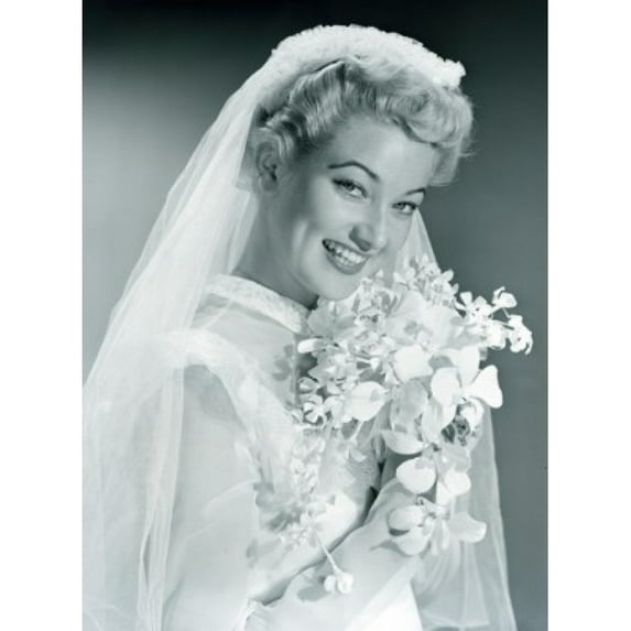 Studio portrait of bride holding bouquet Poster Print (24 x 36)