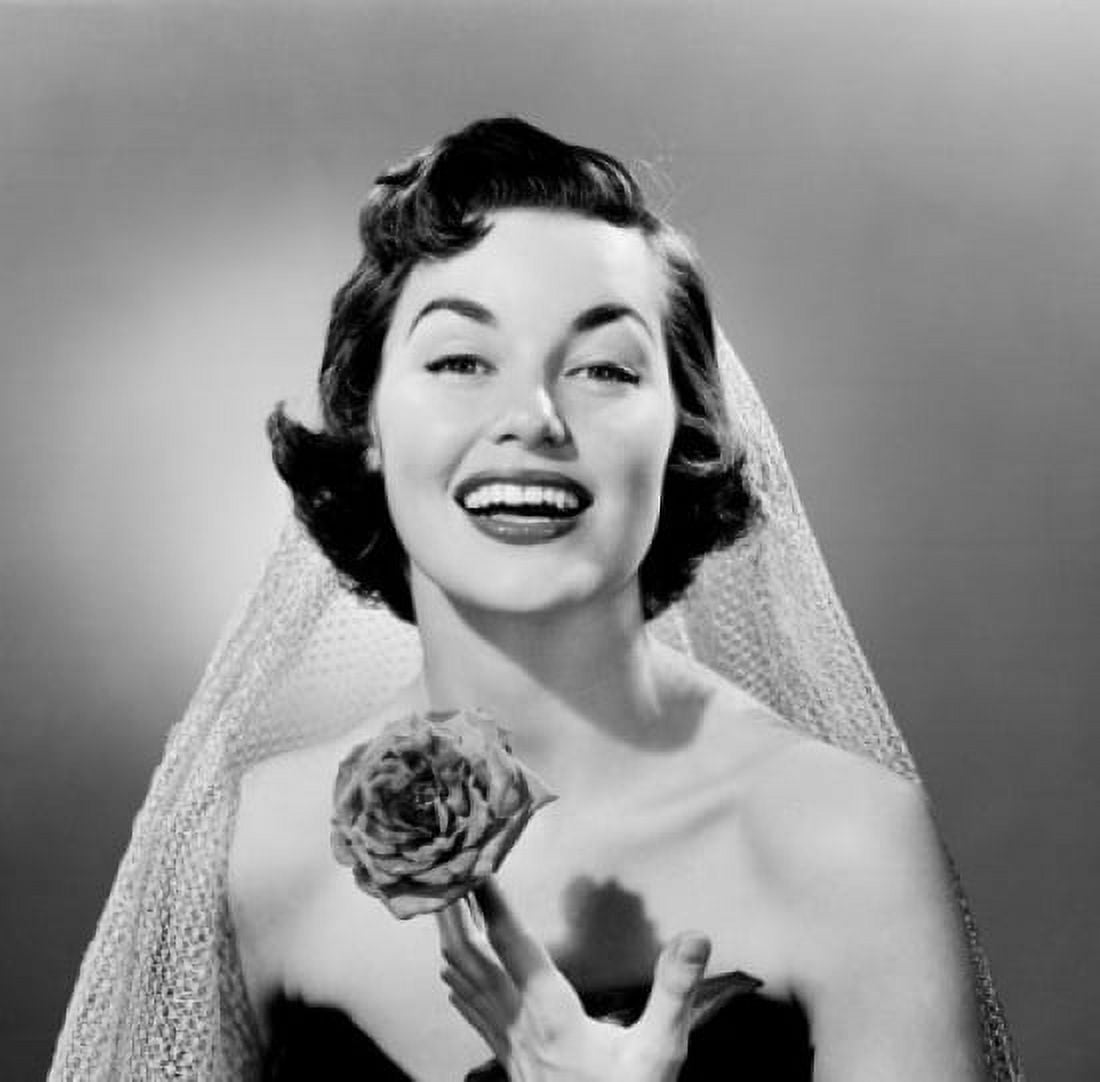 Studio portrait of bride holding rose Canvas Art - (18 x 24)