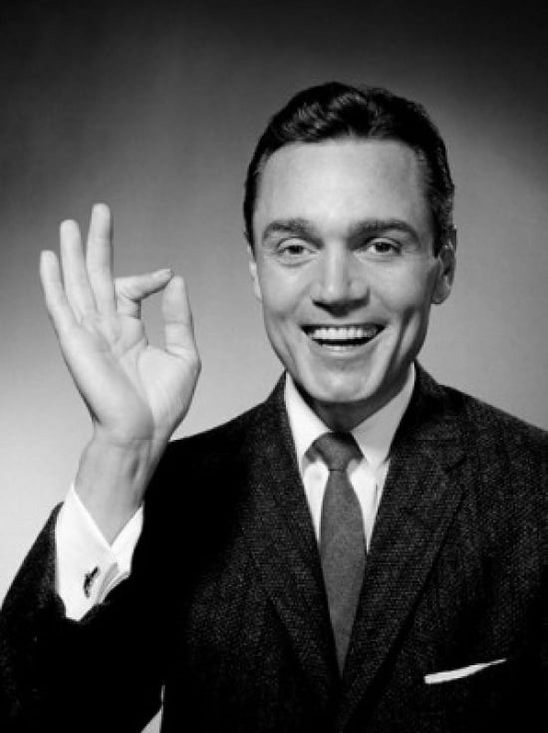 Studio portrait of businessman giving ok sign Canvas Art - (24 x 36)