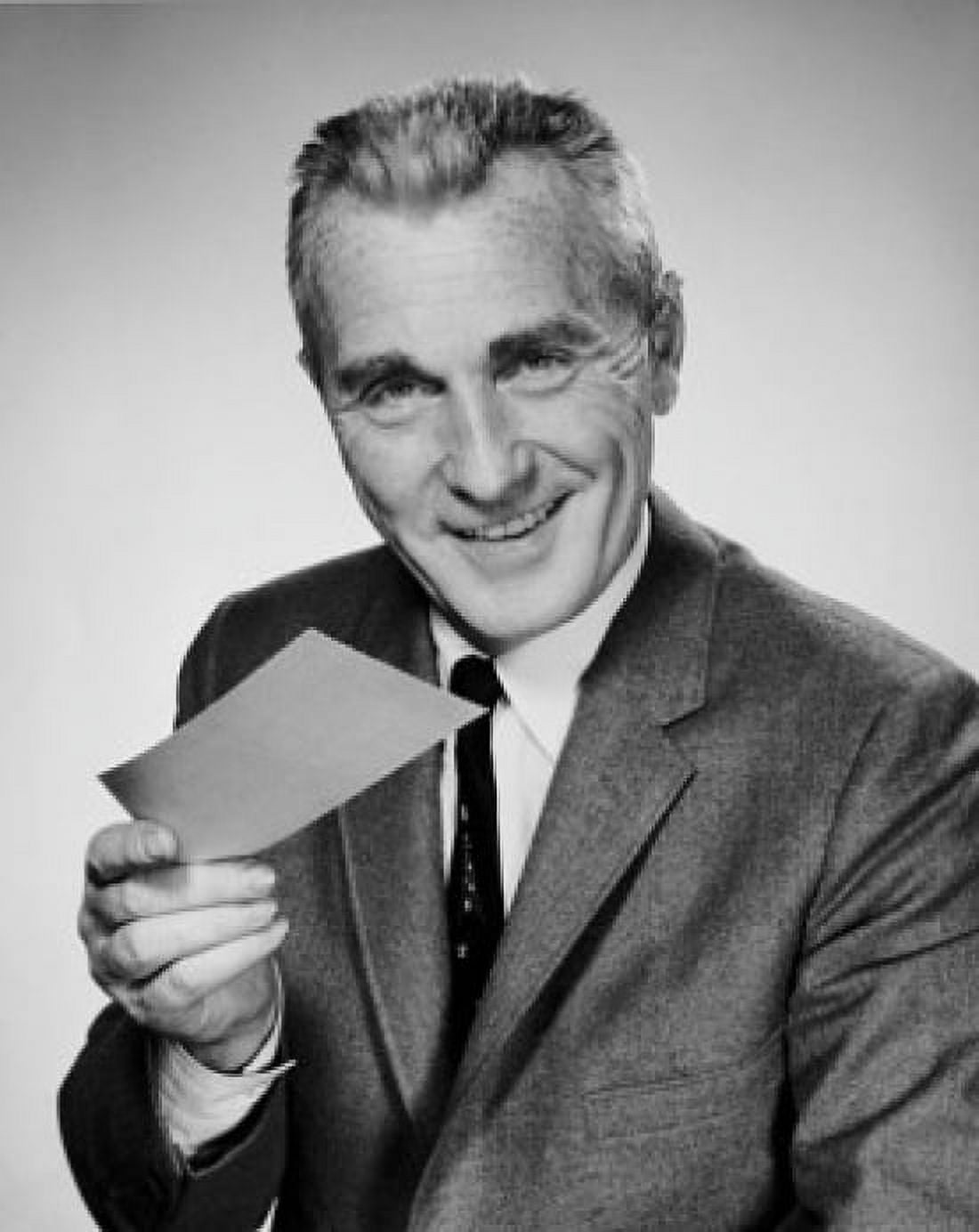 Studio portrait of businessman holding check Canvas Art - (24 x 36)