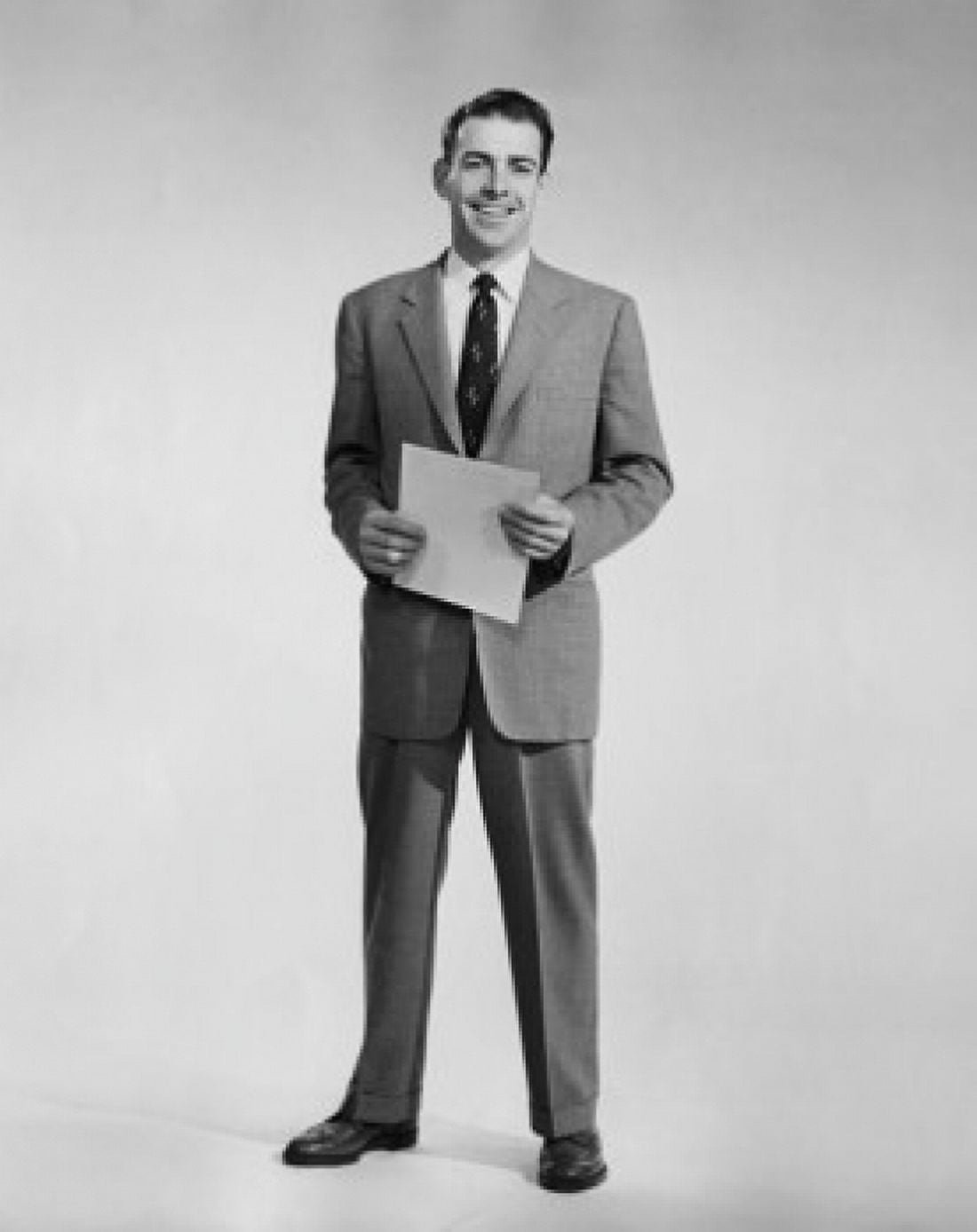 Studio portrait of businessman holding document Canvas Art - (18 x 24)