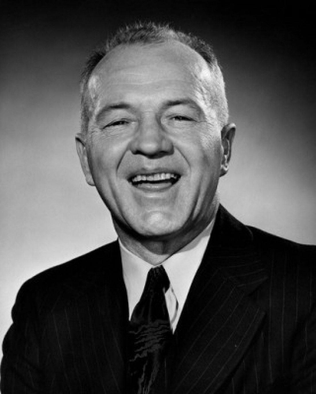 Studio portrait of businessman laughing Canvas Art - (24 x 36)