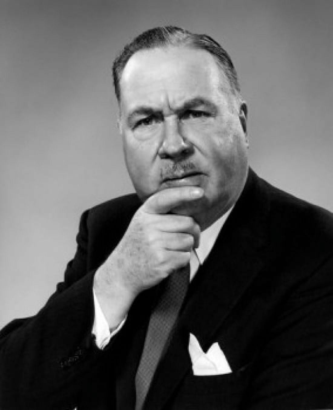 Studio portrait of businessman with hand on chin Canvas Art - (24 x 36)