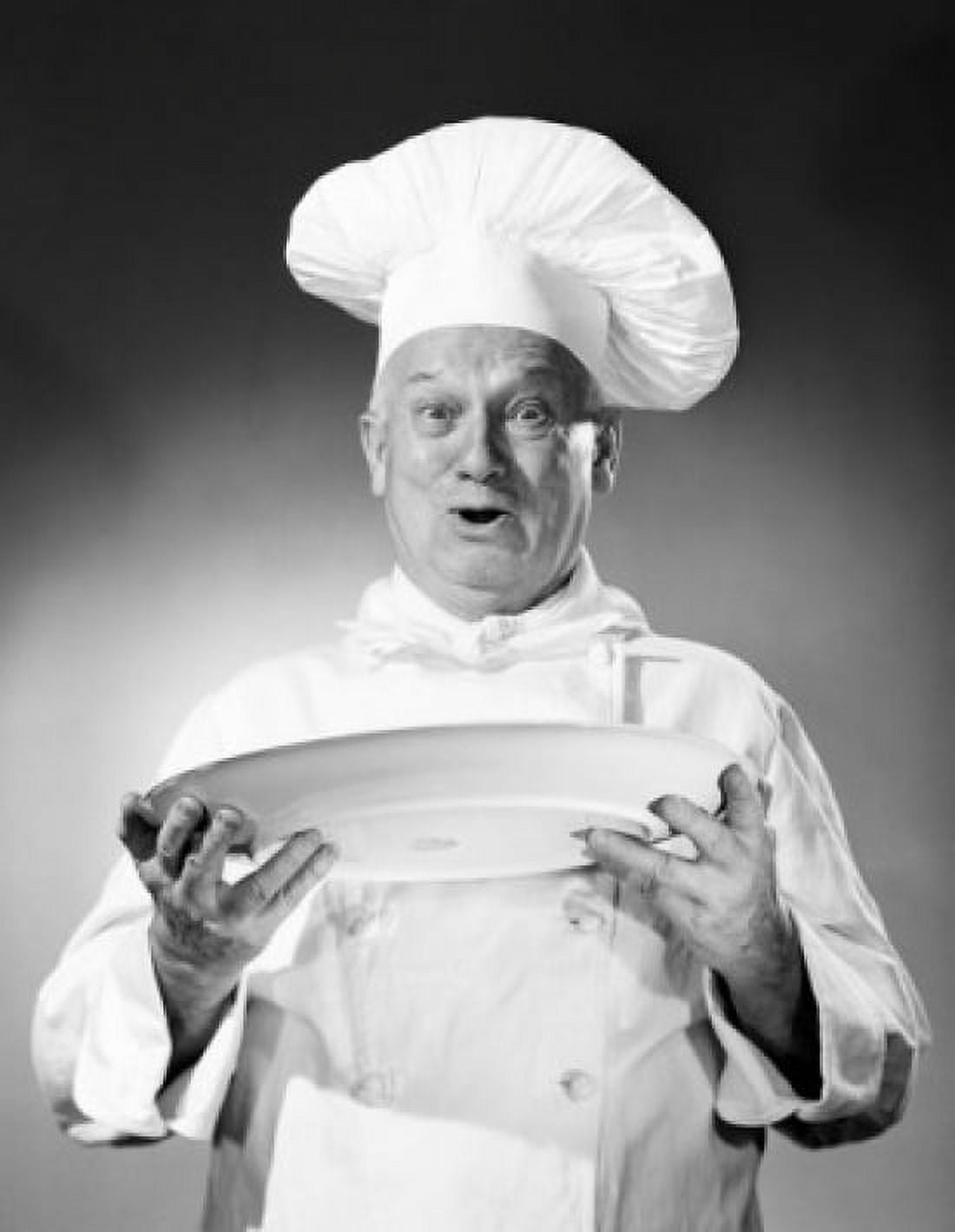 Studio portrait of chef holding plate Canvas Art - (24 x 36)