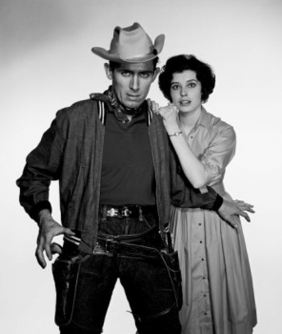 Studio portrait of cowboy defending girlfriend Canvas Art - (18 x 24)