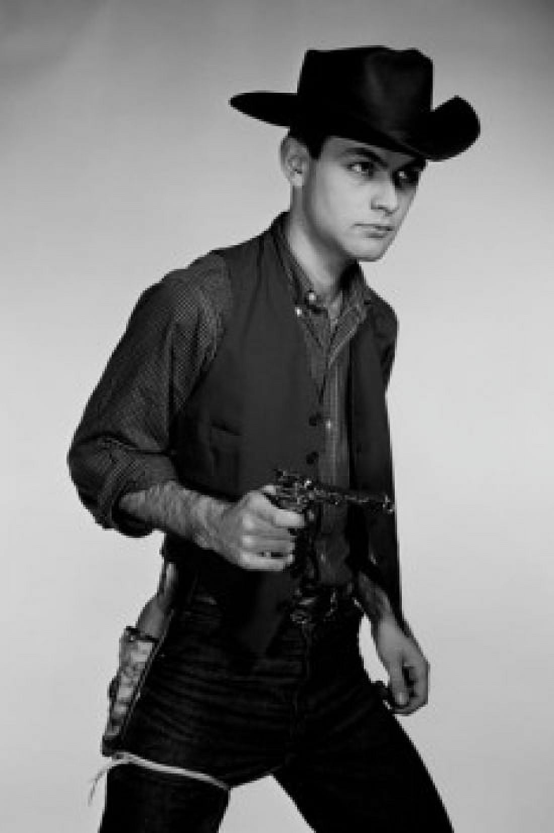 Studio portrait of cowboy with gun Canvas Art - (24 x 36)