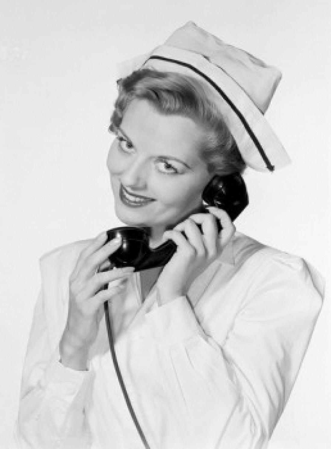 Studio portrait of female nurse using telephone Canvas Art - (18 x 24)