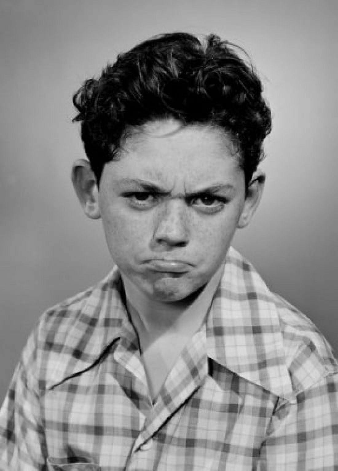 Studio portrait of grumpy boy Canvas Art - (24 x 36)