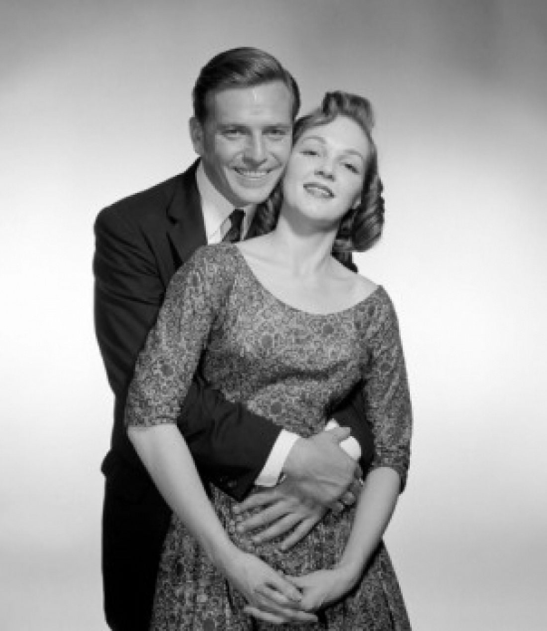 Studio portrait of happy couple embracing Canvas Art - (18 x 24)