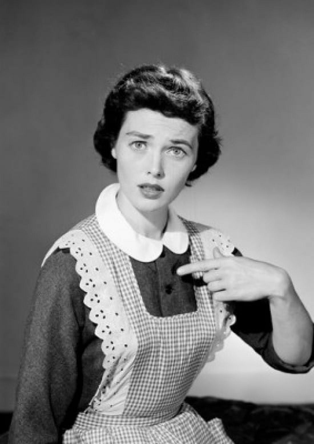 Studio portrait of maid pointing Canvas Art - (18 x 24)
