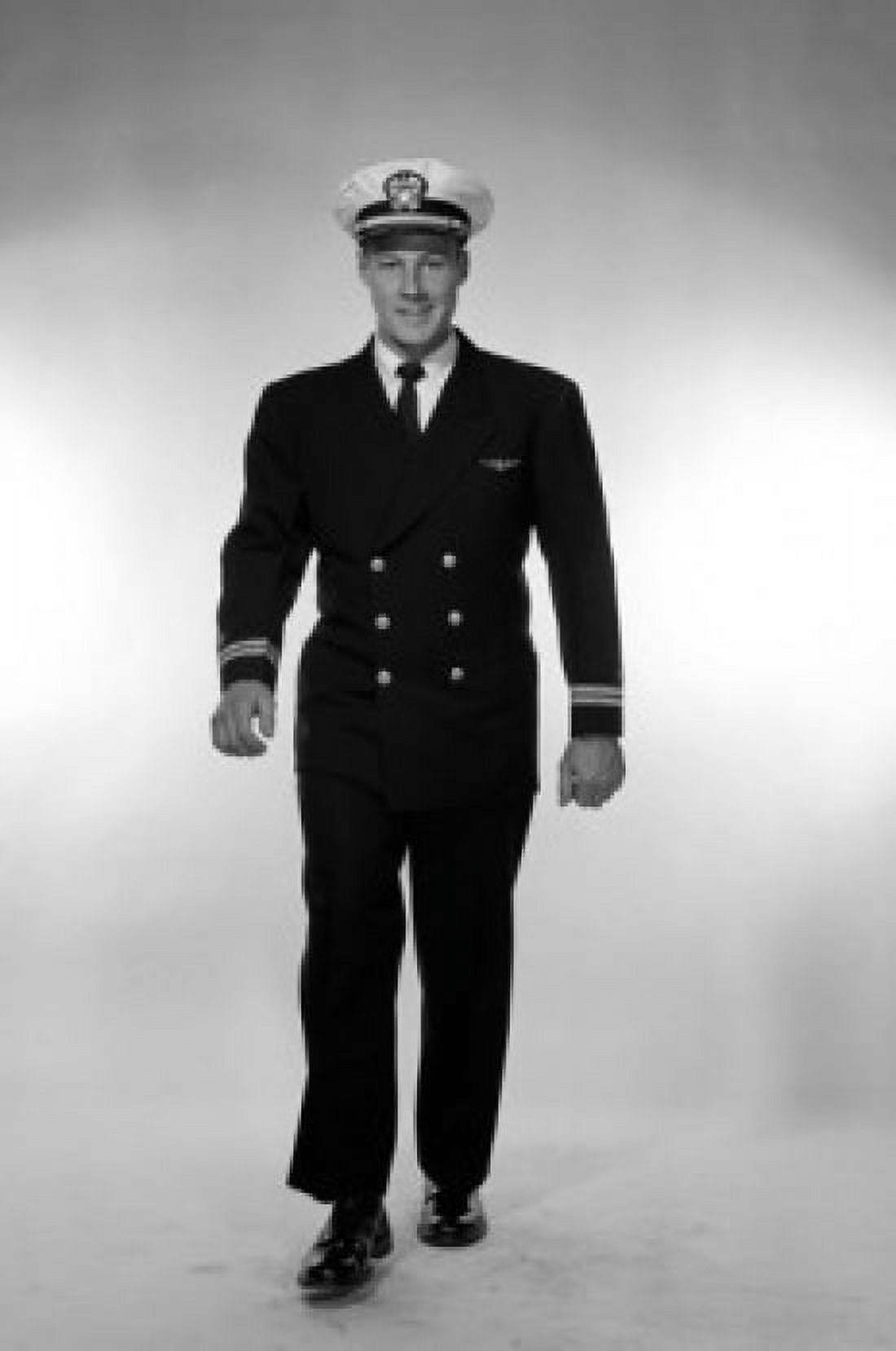 Studio portrait of male pilot walking Canvas Art - (18 x 24)