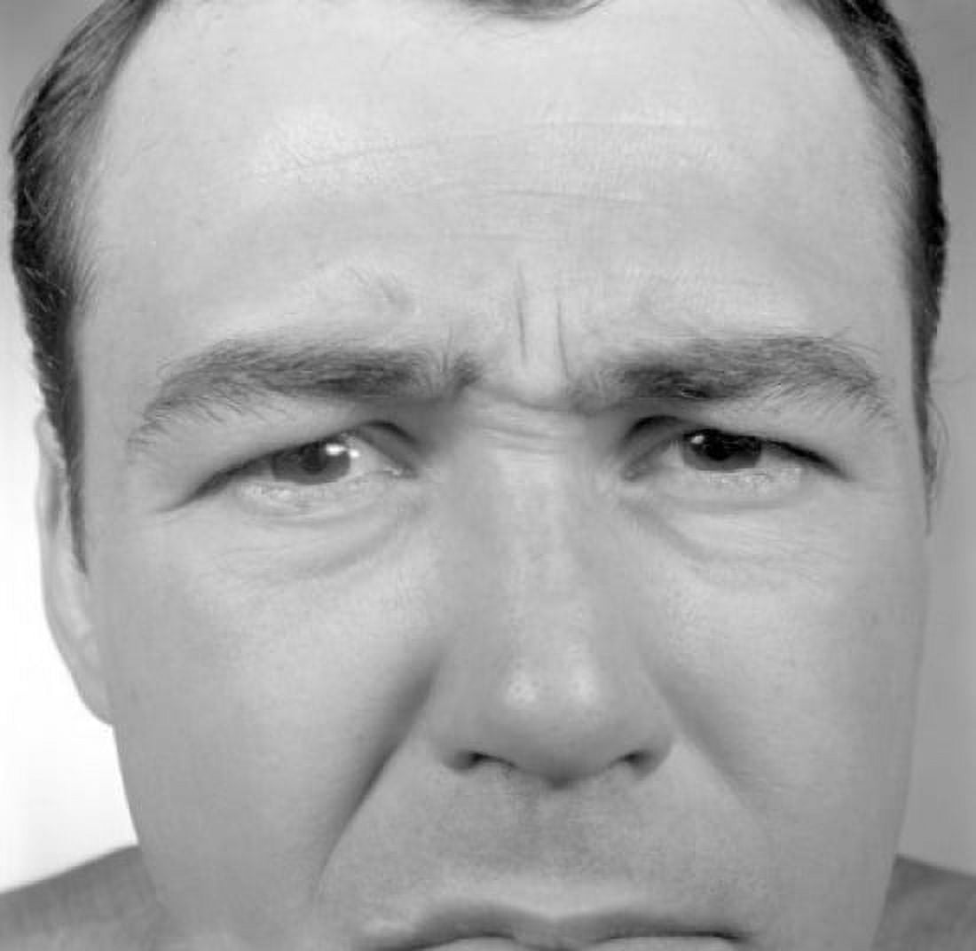 Studio portrait of man frowning Canvas Art - (24 x 36)