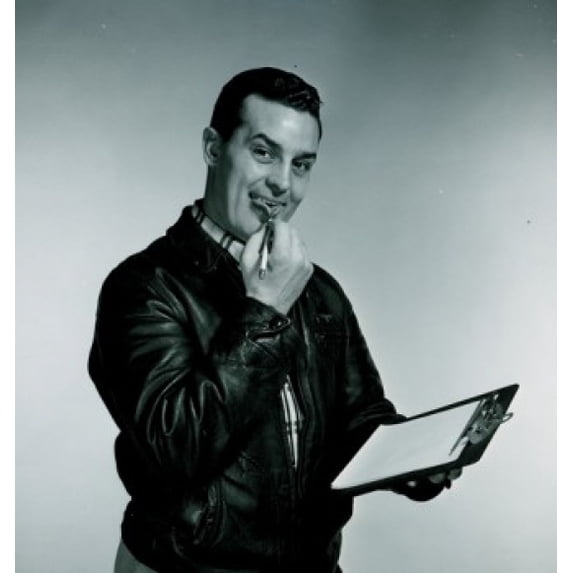 Studio portrait of man holding clipboard and pen Poster Print (18 x 24)