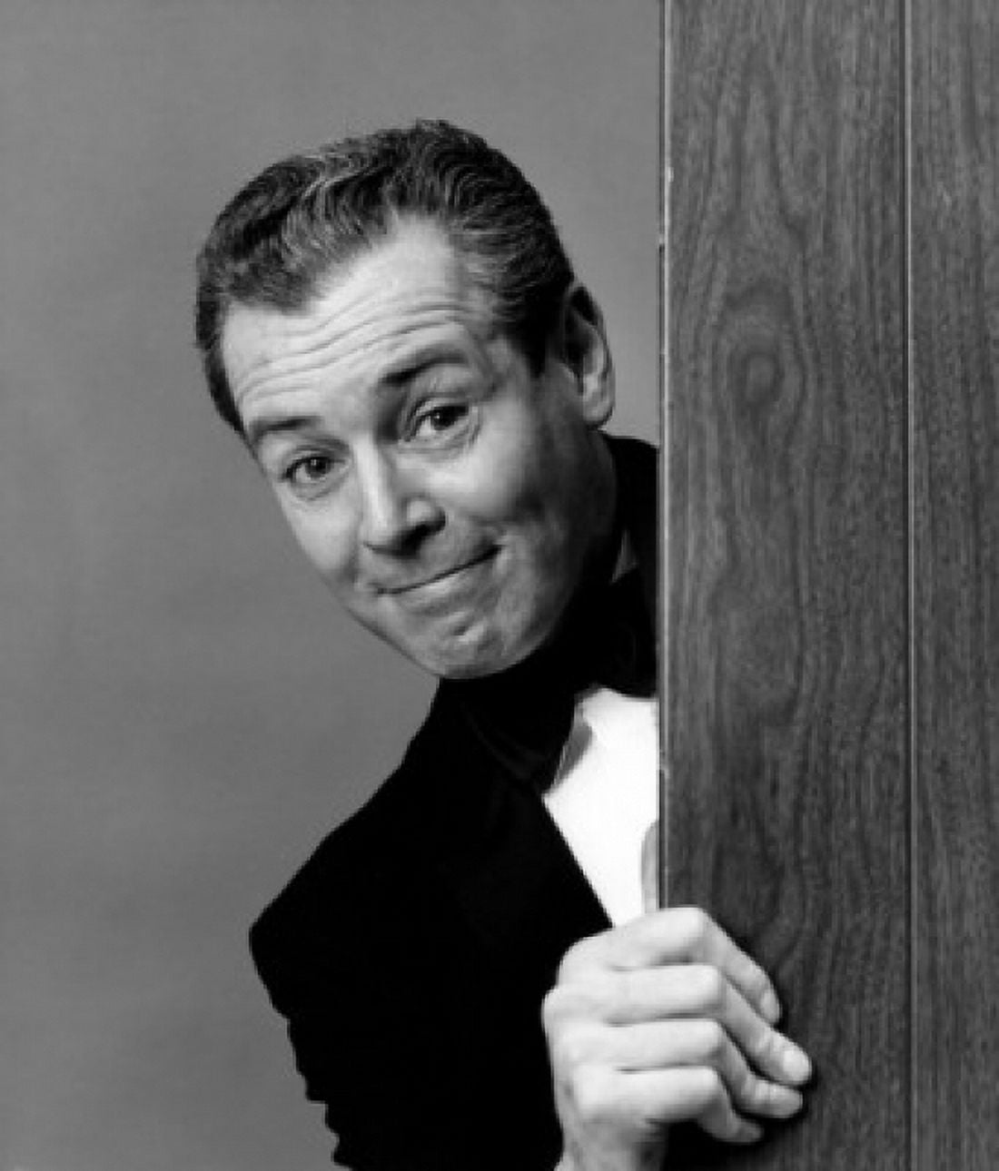 Studio portrait of man peeking from behind door Canvas Art - (18 x 24)