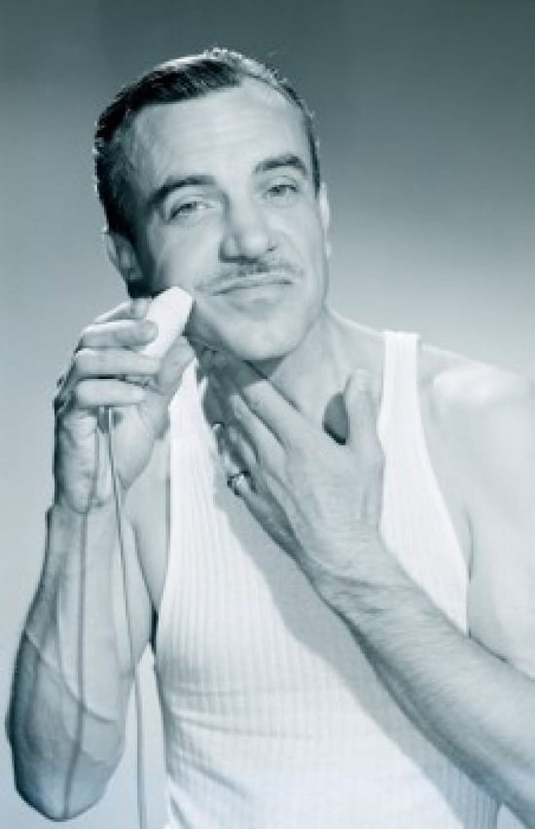 Studio portrait of man shaving Canvas Art - (18 x 24)
