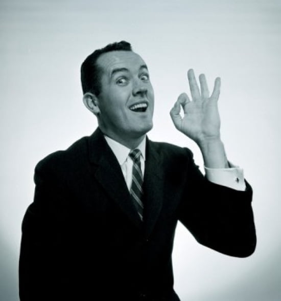 Studio portrait of man showing OK hand sign Canvas Art - (18 x 24)