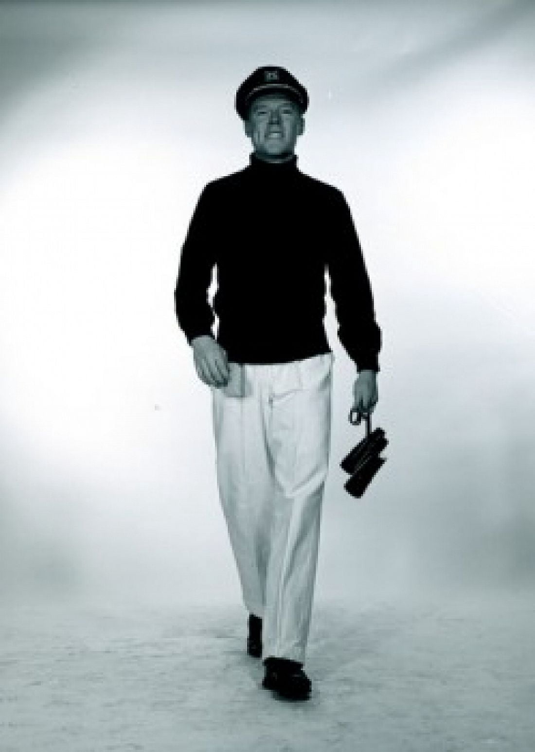 Studio portrait of man wearing sailor hat and carrying binoculars Canvas Art - (18 x 24)