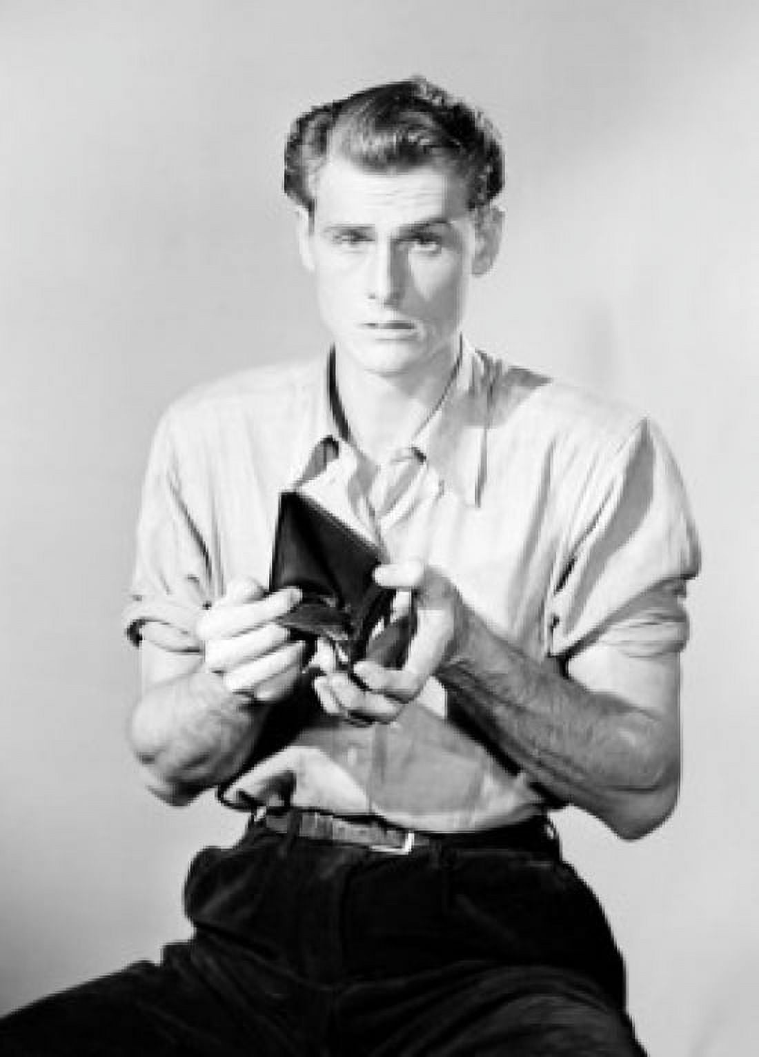 Studio portrait of man with empty wallet Canvas Art - (18 x 24)