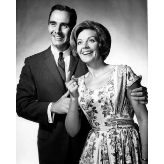 Studio portrait of mid adult couple Poster Print (24 x 36)