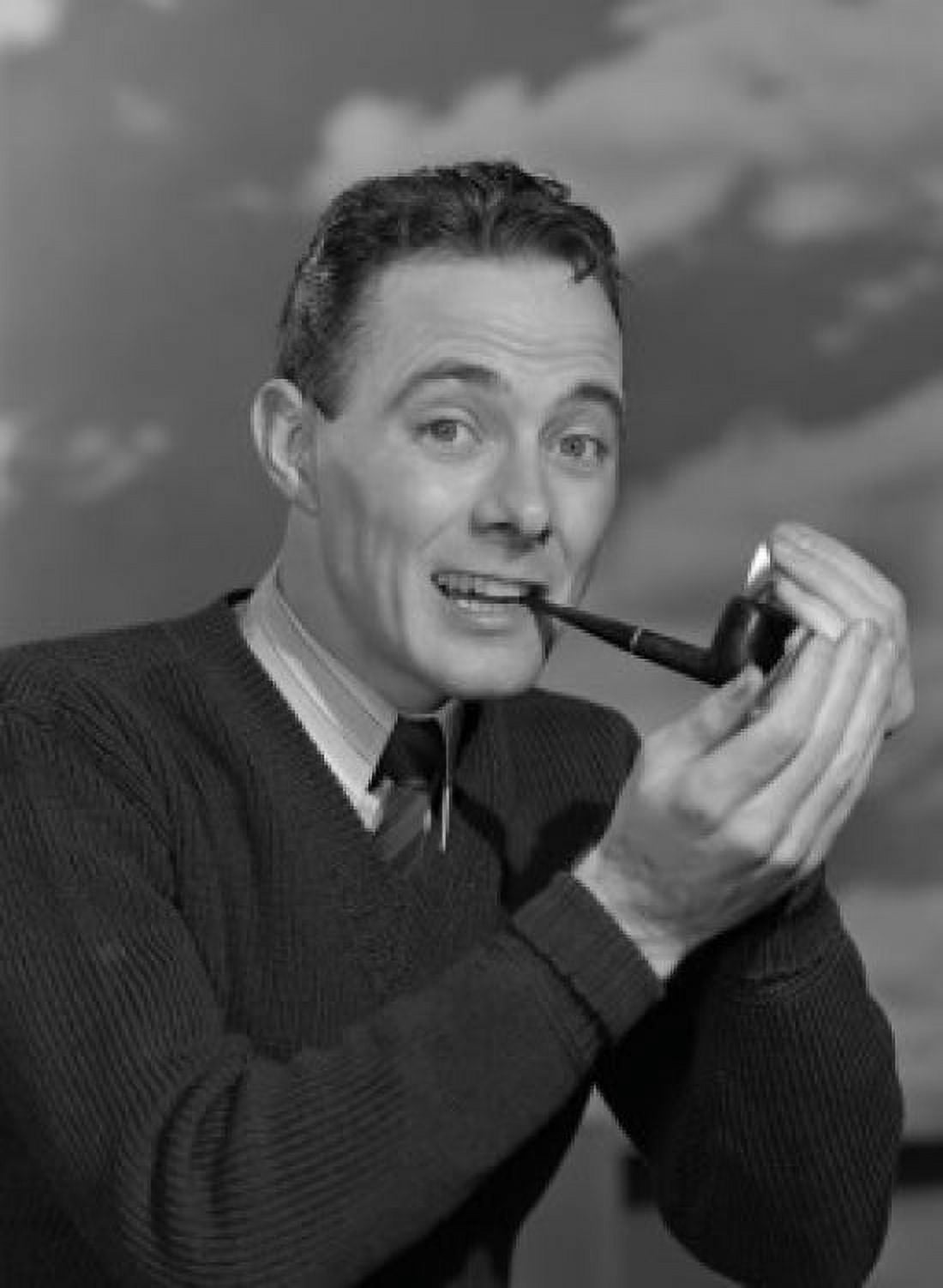 Studio portrait of mid adult man smoking pipe Canvas Art - (24 x 36)