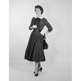 thumbnail image 1 of Studio portrait of mid adult woman Poster Print (18 x 24), 1 of 4