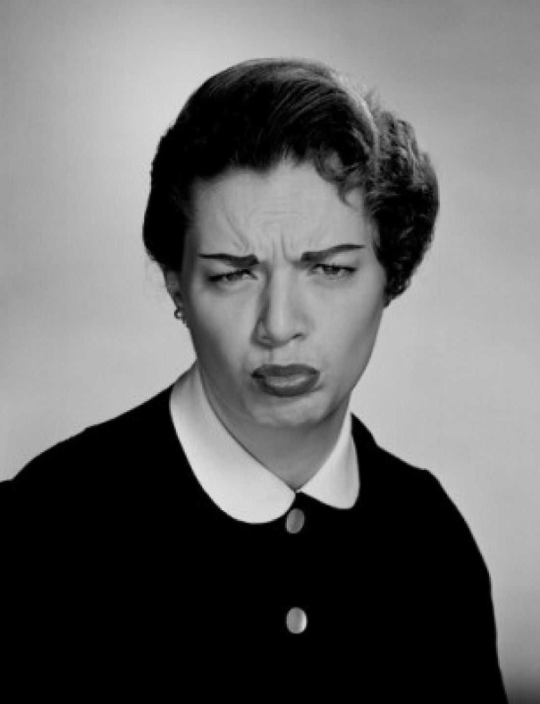 Studio portrait of mid adult woman grimacing Canvas Art - (24 x 36)