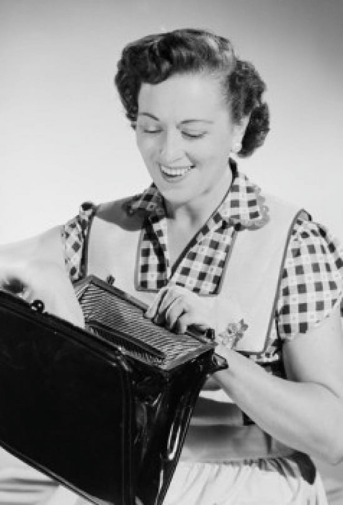 Studio portrait of mid adult woman opening purse Canvas Art - (18 x 24)