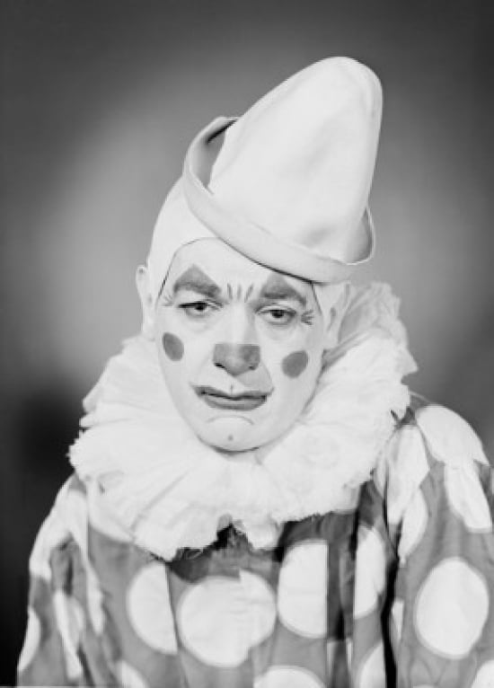 Studio portrait of sad clown Canvas Art - (24 x 36)