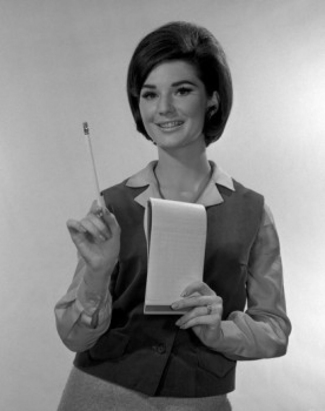 Studio portrait of secretary holding notepad Canvas Art - (24 x 36)