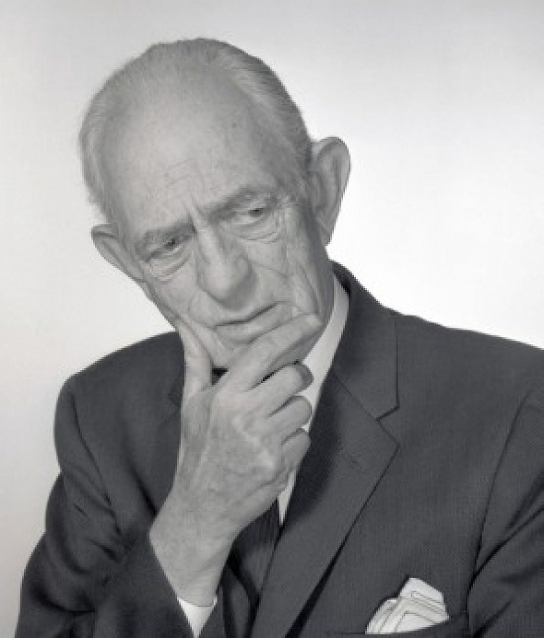 Studio portrait of senior man with hand on chin Canvas Art - (18 x 24)