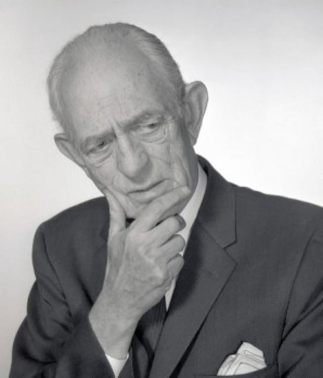 Studio portrait of senior man with hand on chin Canvas Art - (24 x 36)
