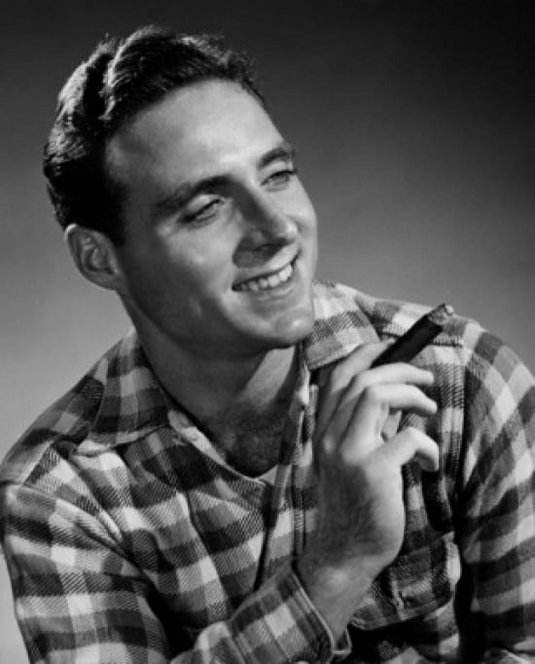 Studio portrait of smiling man holding cigar Canvas Art - (24 x 36)