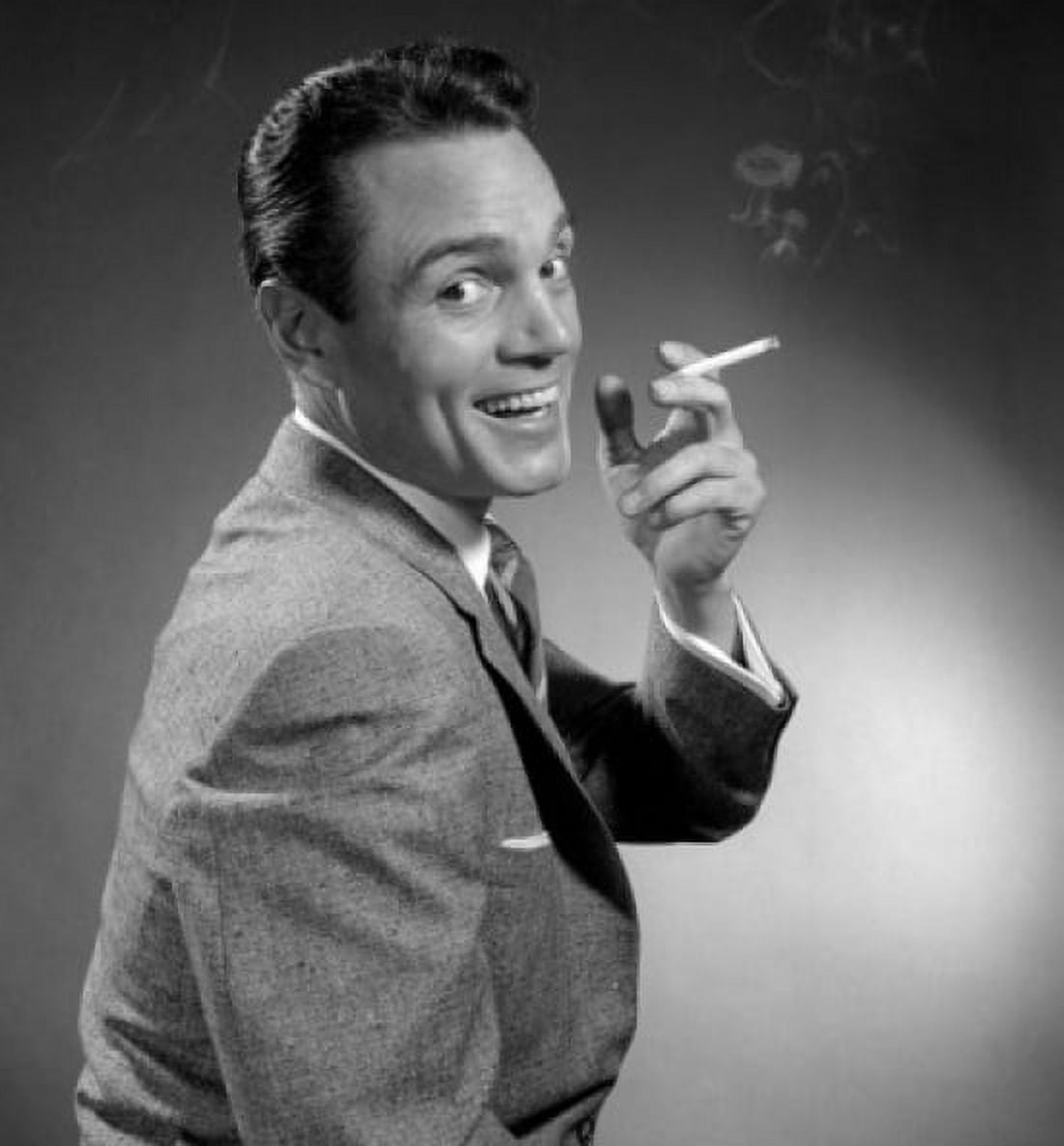 Studio portrait of smiling man holding cigarette Canvas Art - (18 x 24)