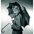 thumbnail image 1 of Studio portrait of smiling woman with umbrella Poster Print (24 x 36), 1 of 4